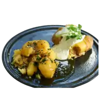 Timberjacks Kartoffelringe mit Butter, Muskatnuss und Kräutersalz